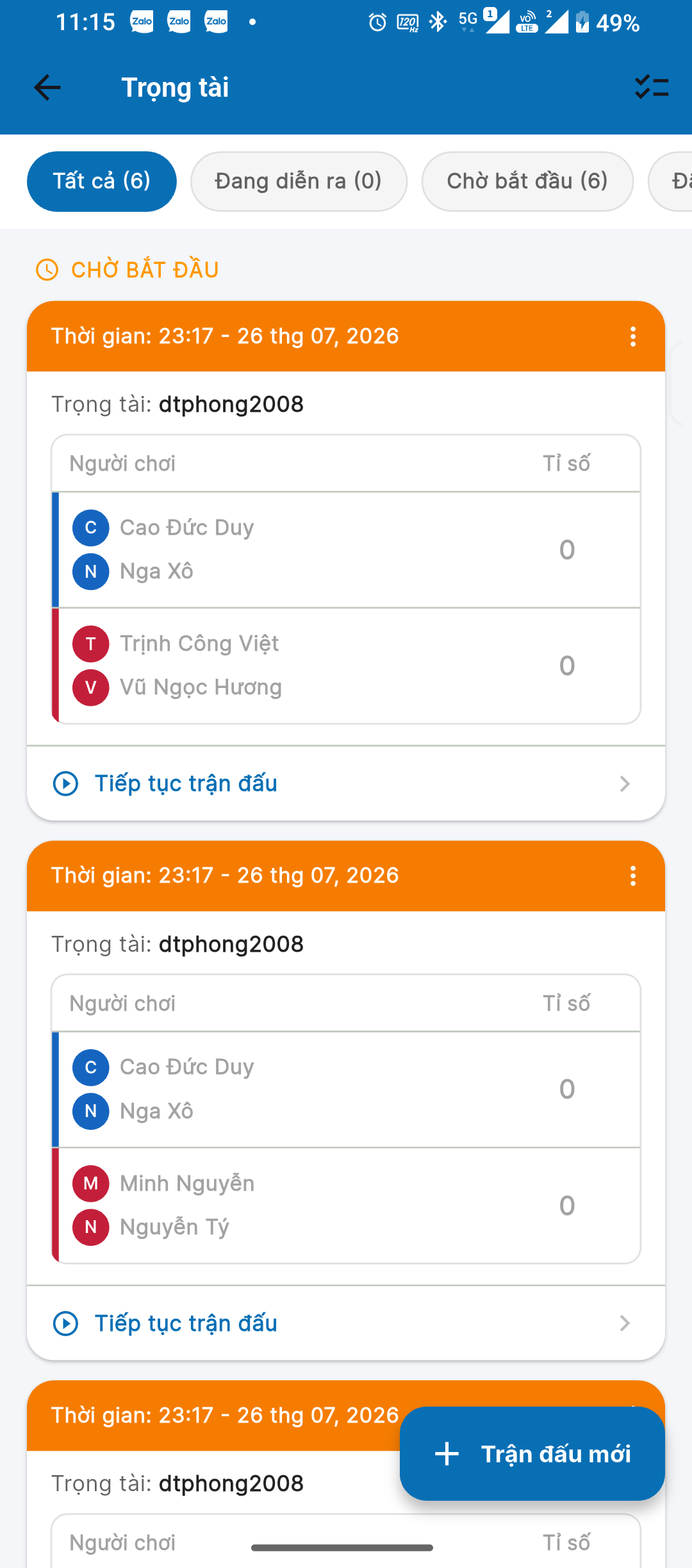 Referee match queue grouped by status, each card showing both pairs and their current score