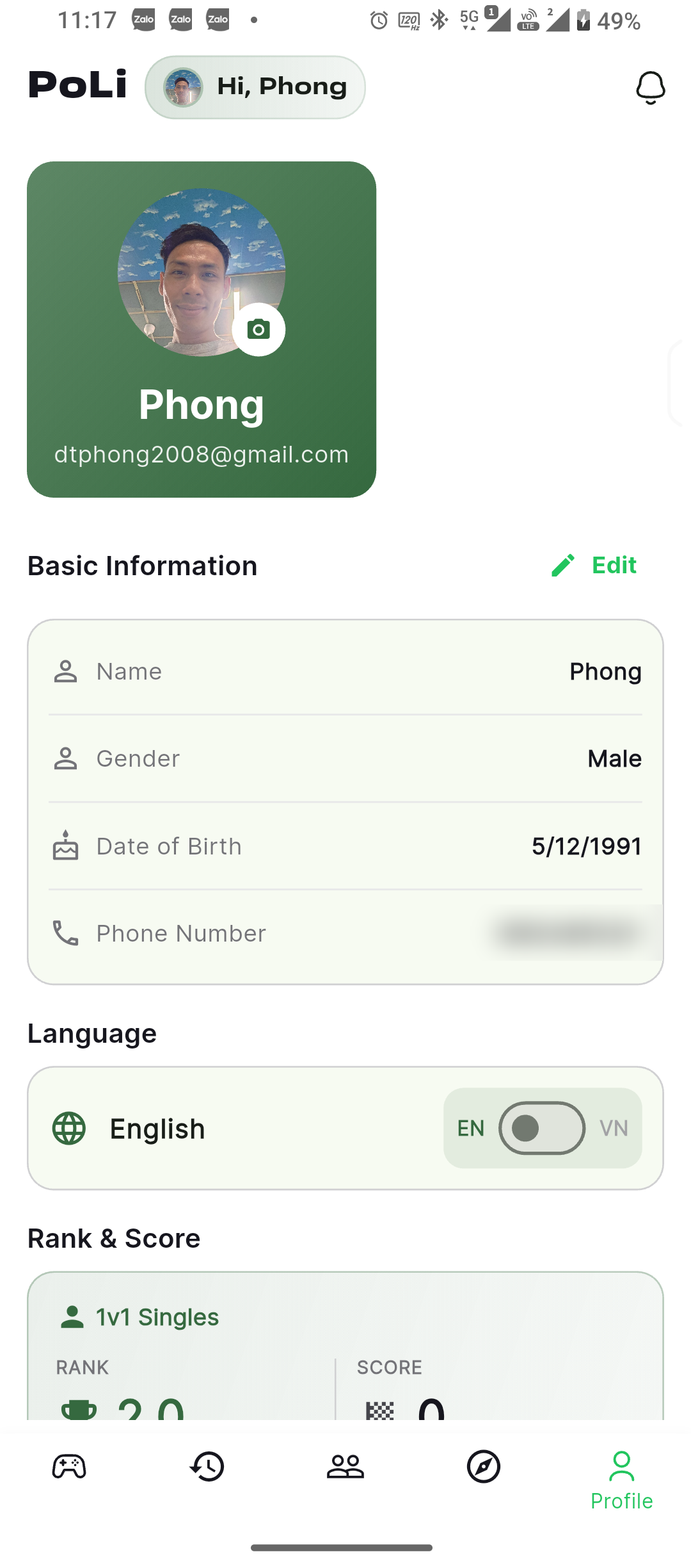 Profile screen with basic information, a runtime English/Vietnamese language switch, and rank and score per format